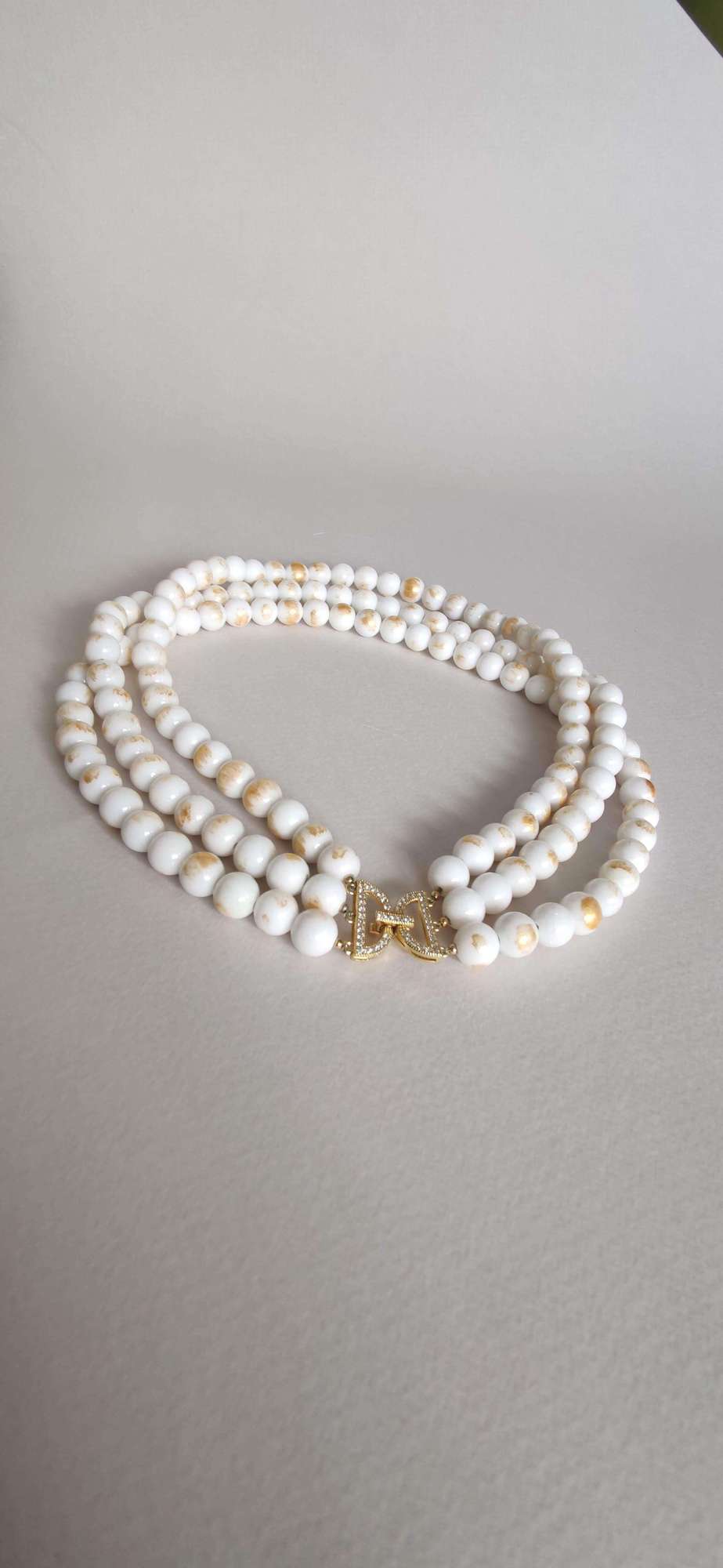 чекер из жадеита с золотой патиной