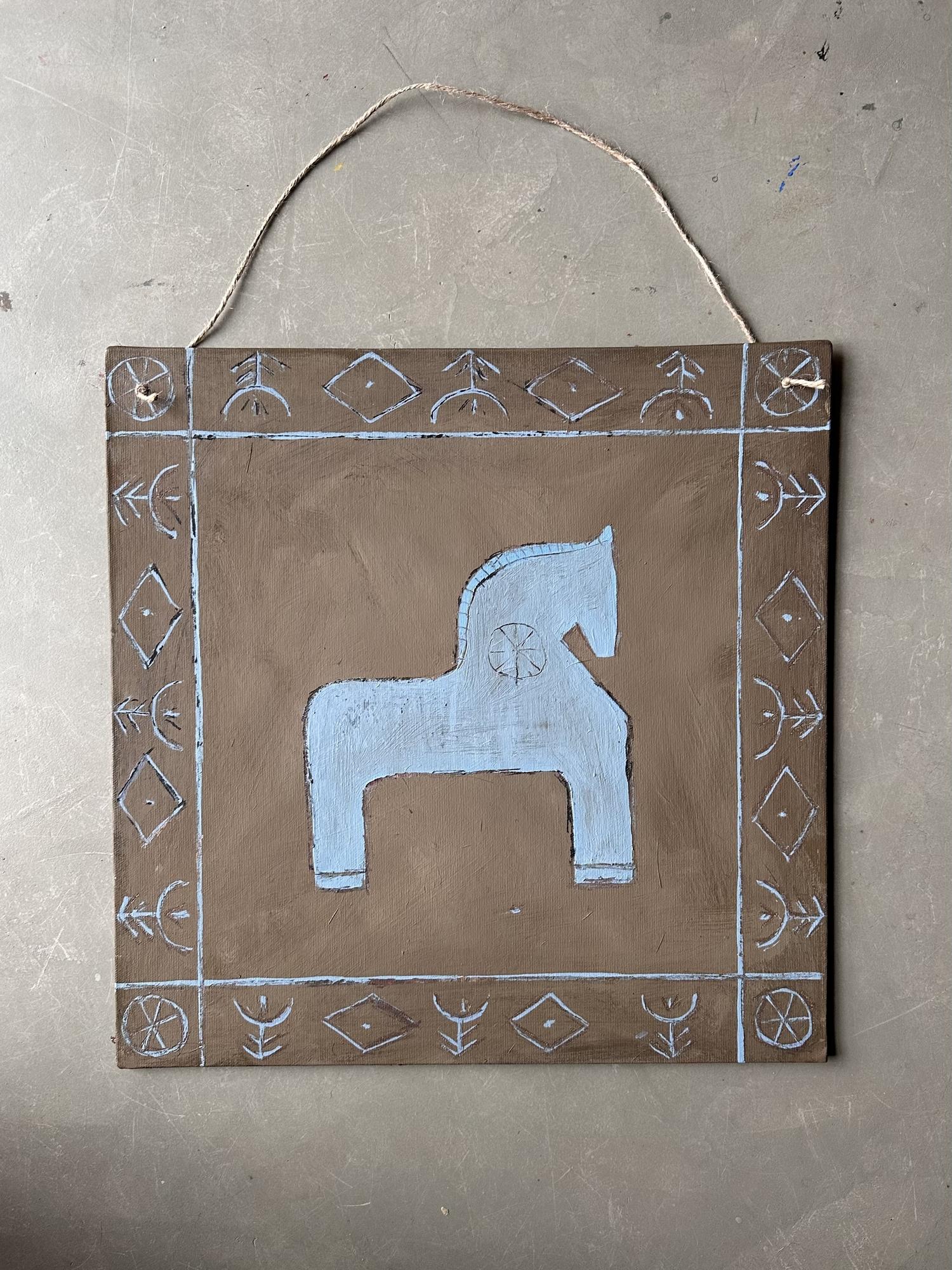 Синяя лошадка